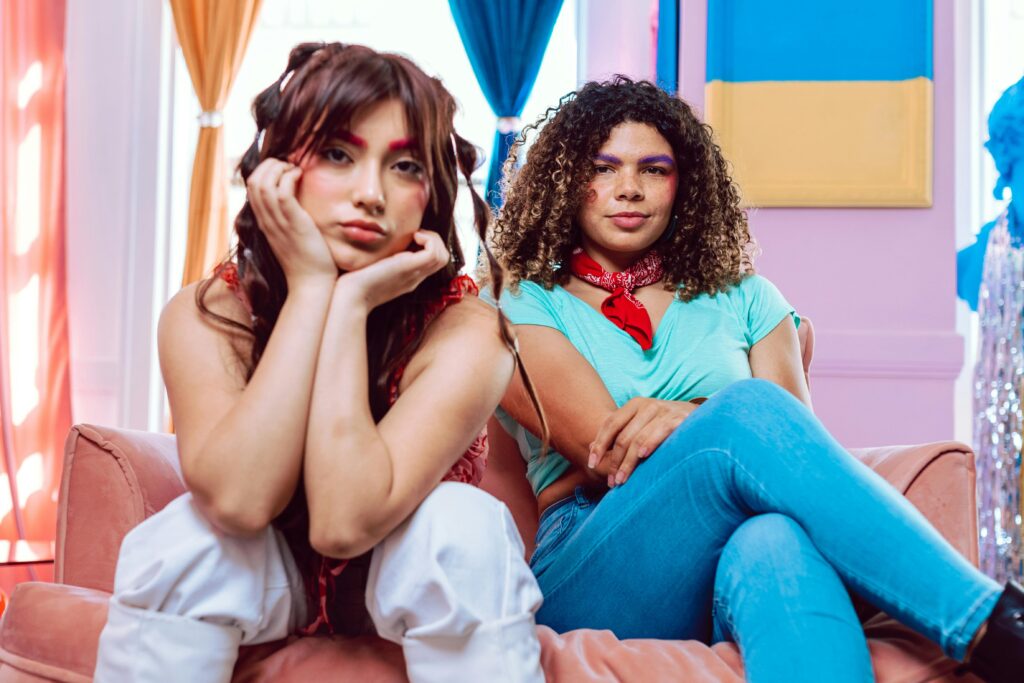 friends doing a photoshoot asking Am I nonbinary or just gender nonconforming